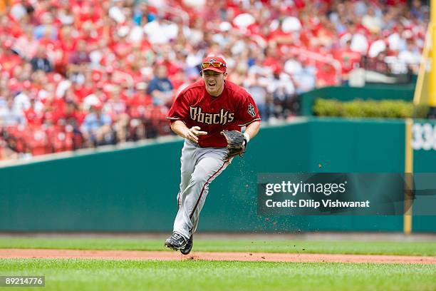 Stephen Drew of the Arizona Diamondbacks fields a ground ball against the St. Louis Cardinals on July 19, 2009 at Busch Stadium in St. Louis,...