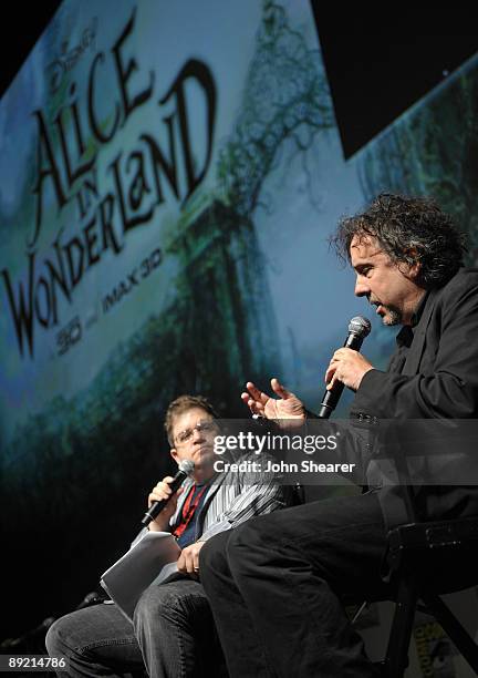 Director Tim Burton speaks at "Alice in Wonderland" press conference with moderator/actor Patton Oswalt during Comic-Con 2009 held at San Diego...