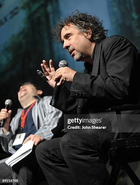Director Tim Burton speaks at "Alice in Wonderland" press conference with moderator/actor Patton Oswalt during Comic-Con 2009 held at San Diego...