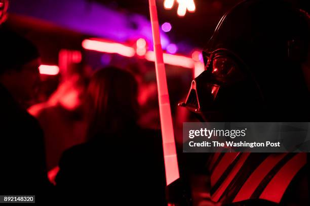 Luis Gonzalez, dressed as Darth Vader, stands at the Dark Side Bar, a Star Wars themed pop up bar, in Washington, DC on December 2, 2017.