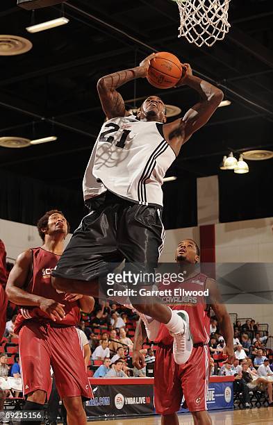 Amir Johnson of the Milwaukee Bucks takes the ball to the basket against the Cleveland Cavaliers during the NBA Summer League presented by EA Sports...