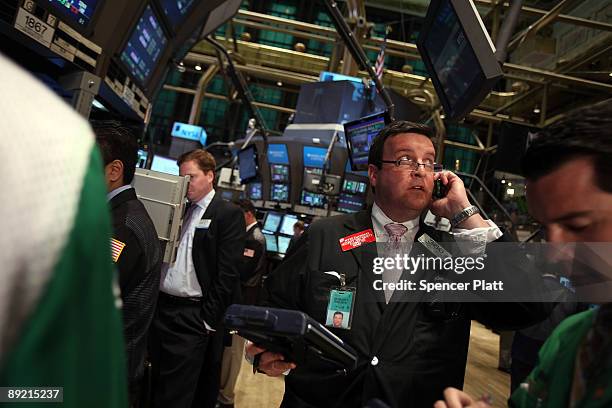 Traders work on the floor of the New York Stock Exchange on July 23, 2009 in New York, New York. As positive economic news continued to emerge, the...