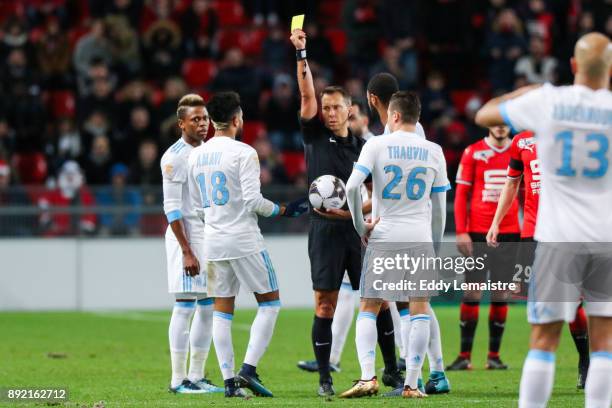 Referee gives a yellow card to Jordan Amavi of Marseille during the french League Cup match, Round of 16, between Rennes and Marseille on December...