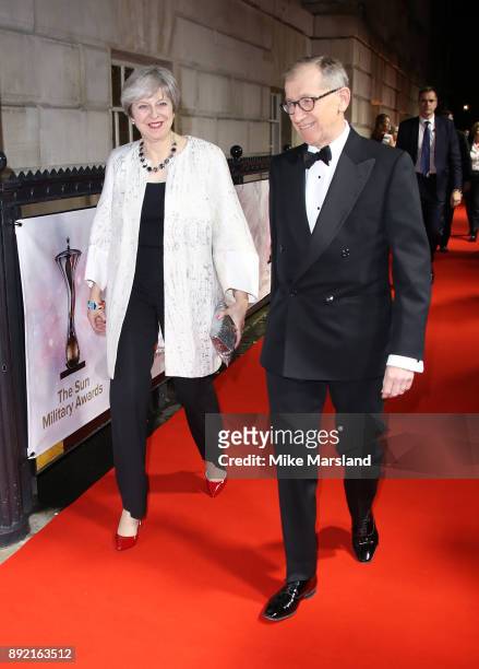 Theresa May and Philip May attend The Sun Military Awards at Banqueting House on December 13, 2017 in London, England.