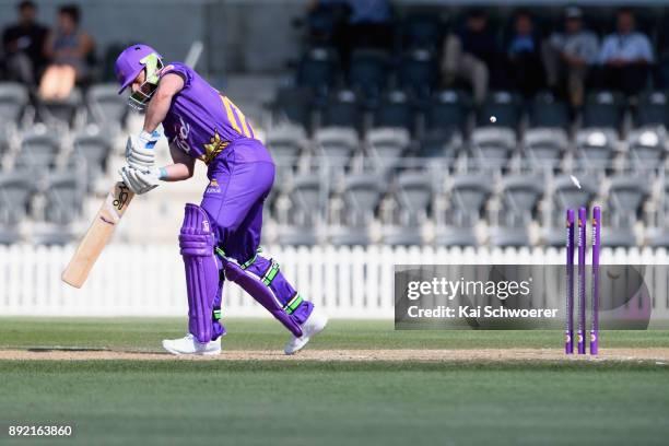 Cameron Fletcher of Canterbury is dismissed by James Neesham of Otago during the Supersmash Twenty20 match between Canterbury and Otago on December...