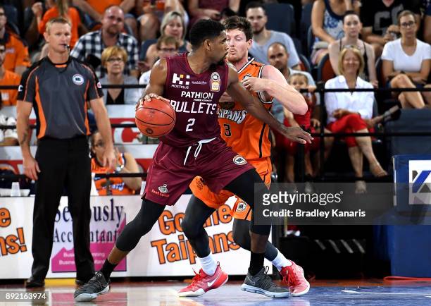 Perrin Buford of the Bullets takes on the defence during the round 10 NBL match between the Cairns Taipans and the Brisbane Bullets at Cairns...