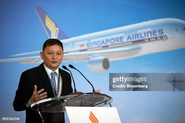 Goh Choon Phong, chief executive officer of Singapore Airlines Ltd., speaks during the welcome ceremony for the Airbus SE A380 aircraft with refitted...