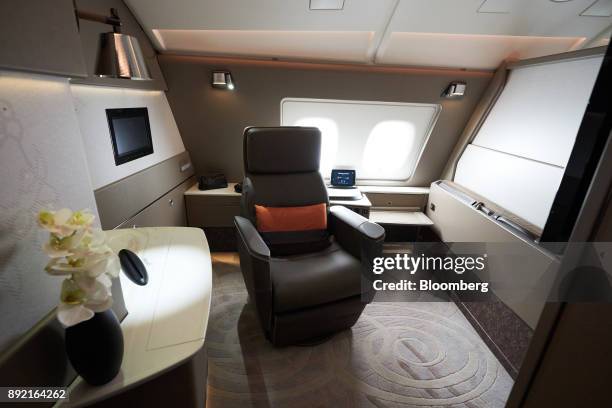 The features of a suite of a Singapore Airlines Ltd. Airbus SE A380 aircraft with refitted cabins are seen during a media tour at Changi Airport in...