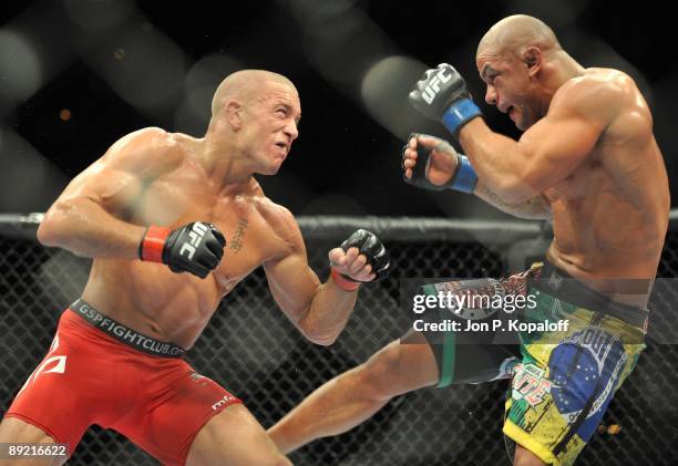 Welterweight fighters Georges St-Pierre battles Thiago Alves during their Welterweight title bout at UFC 100 the Mandalay Bay Hotel and Casino on...