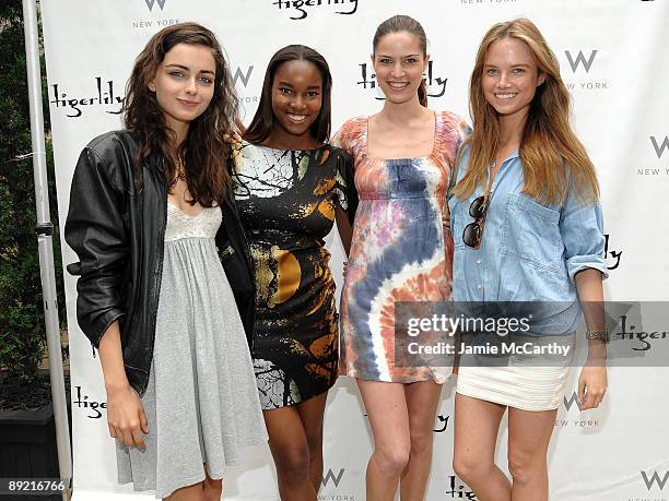 Models Darla Begood, Damaris Lewis, Melissa Haro and Alicia Rountree attend the Tigerlily summer luncheon at the W Hotel on July 23, 2009 in New York...