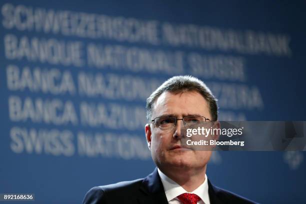 Thomas Jordan, president of the Swiss National Bank , pauses during the bank's rate announcement news conference in Bern, Switzerland, on Thursday,...