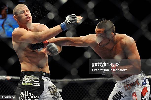 Middleweights Dan Henderson battles Michael Bisping during their Middleweight bout at UFC 100 the Mandalay Bay Hotel and Casino on July 11, 2009 in...