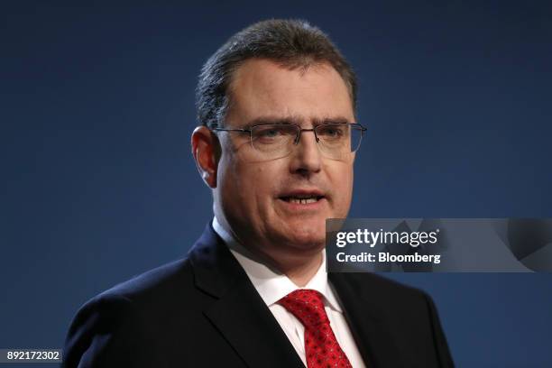 Thomas Jordan, president of the Swiss National Bank , speaks during the bank's rate announcement news conference in Bern, Switzerland, on Thursday,...