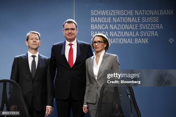 Fritz Zurbruegg, vice president of the Swiss National Bank , left, Thomas Jordan, president of the Swiss National Bank, center, and Andrea Maechler,...