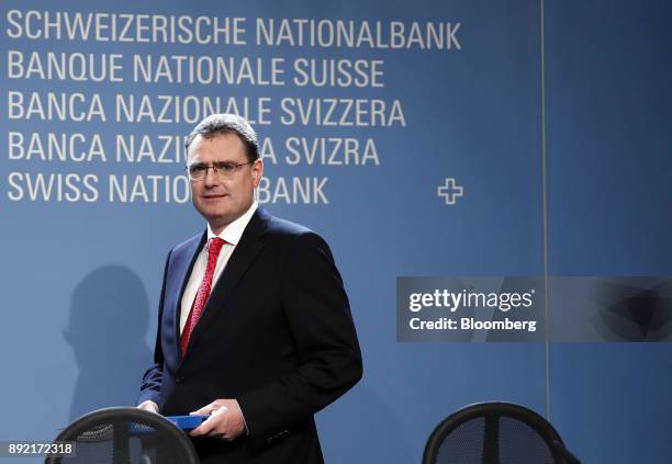 Thomas Jordan, president of the Swiss National Bank , arrives for the bank's rate announcement news conference in Bern, Switzerland, on Thursday,...
