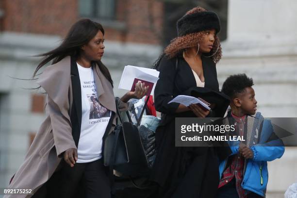 Mourners arrive at St Paul's cathedral for a Grenfell Tower National Memorial service on December 14, 2017 in central London. - The fire on June 14...