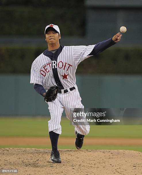 Fu-Te Ni of the Detroit Tigers pitches while wearing a Detroit Stars Negro League Tribute uniform against the Cleveland Indians during the game at...