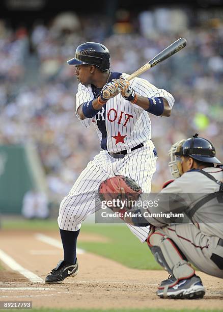 Curtis Granderson of the Detroit Tigers bats while wearing a Detroit Stars Negro League Tribute uniform against the Cleveland Indians during the game...