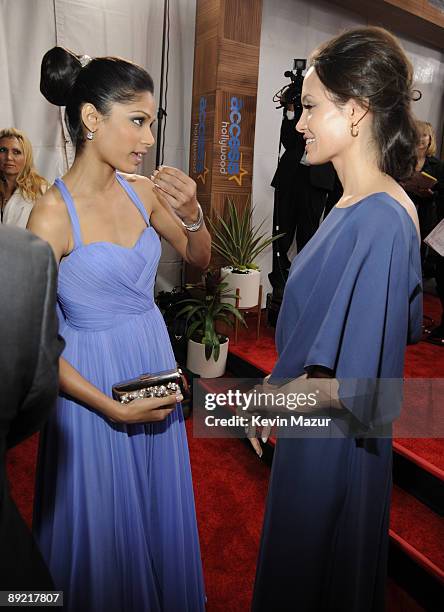 Actress Freida Pinto and Angelina Jolie arrives to the TNT/TBS broadcast of the 15th Annual Screen Actors Guild Awards at the Shrine Auditorium on...