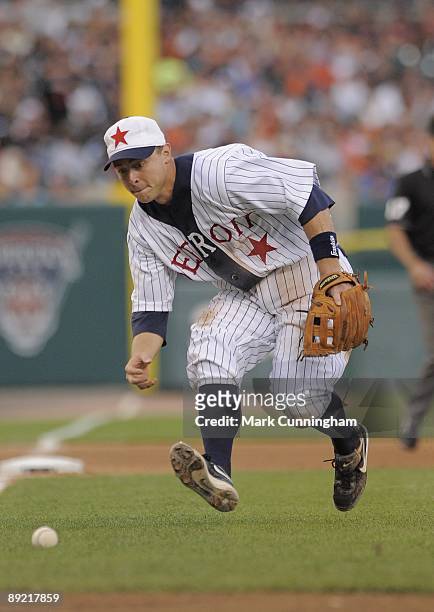 Brandon Inge of the Detroit Tigers fields while wearing a Detroit Stars Negro League Tribute uniform against the Cleveland Indians during the game at...