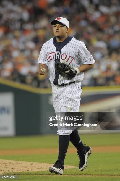 Miguel Cabrera of the Detroit Tigers runs off the field while wearing a Detroit Stars Negro League Tribute uniform against the Cleveland Indians...