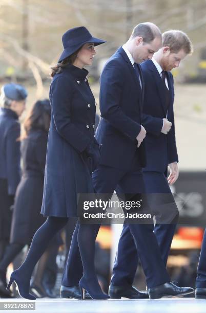 Catherine, Duchess of Cambridge, Prince William, Duke of Cambridge and Prince Harry attend the Grenfell Tower National Memorial Service held at St...