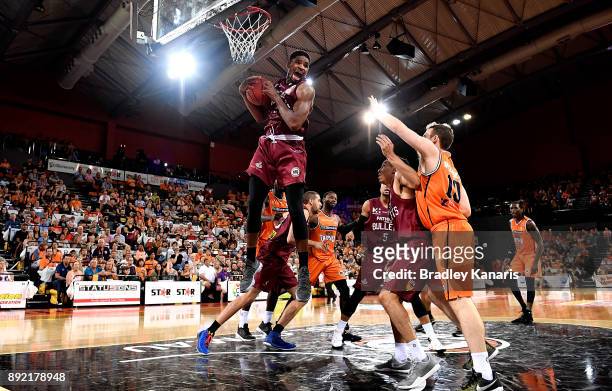 Perrin Buford of the Bullets takes a rebound during the round 10 NBL match between the Cairns Taipans and the Brisbane Bullets at Cairns Convention...