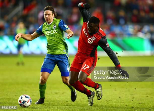 Jozy Altidore of Toronto FC battles with Gustav Svensson of the Seattle Sounders for the ball during the first half of the 2017 MLS Cup Final at BMO...