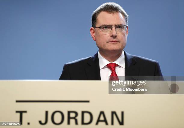 Thomas Jordan, president of the Swiss National Bank , pauses during the bank's rate announcement news conference in Bern, Switzerland, on Thursday,...