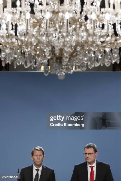 Fritz Zurbruegg, vice president of the Swiss National Bank , left, and Thomas Jordan, president of the Swiss National Bank , listen during the bank's...