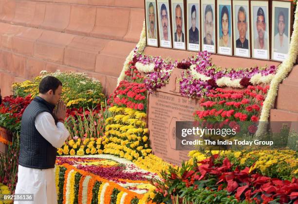 Congress Party President Rahul Gandhi pays homage during a remembrance ceremony for the 2001 attack on Parliament at Parliament House in New Delhi.