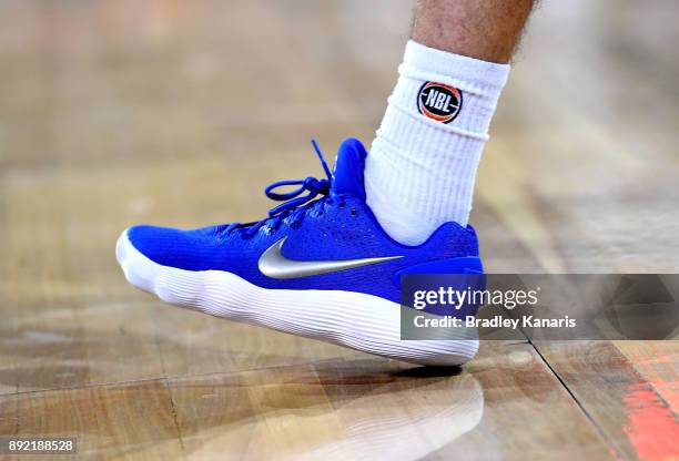 Shaun Bruce of the Bullets wears Nike branded shoes in aid of a charity during the round 10 NBL match between the Cairns Taipans and the Brisbane...