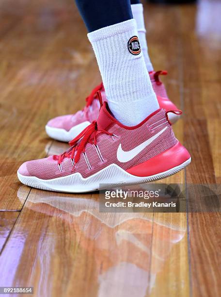 Cameron Gliddon of the Taipans wears Nike branded shoes in aid of a charity during the round 10 NBL match between the Cairns Taipans and the Brisbane...
