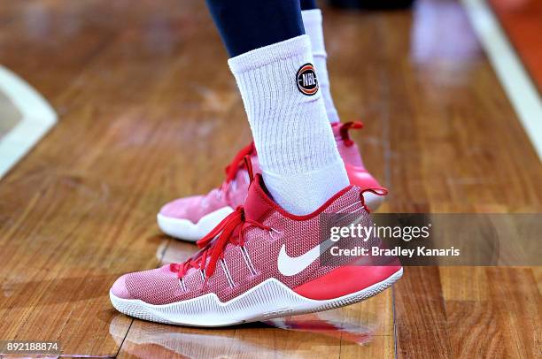Cameron Gliddon of the Taipans wears Nike branded shoes in aid of a charity during the round 10 NBL match between the Cairns Taipans and the Brisbane...