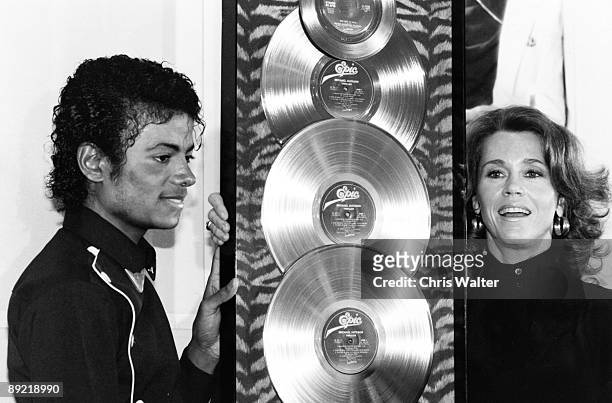 Michael Jackson 1983 presented with the first Triple Platimum awards for the multi-platinum 'Thriller" album by Jane Fonda.