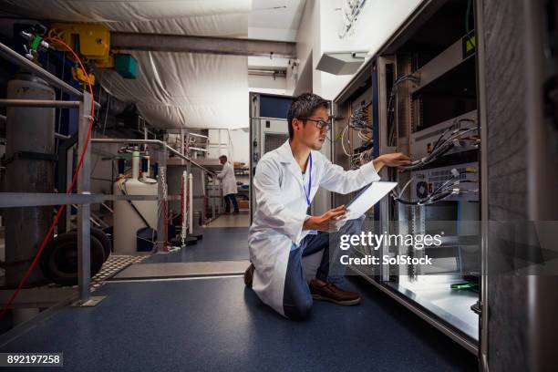 wetenschap technicus - natuurkundige stockfoto's en -beelden