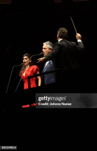 Larisa Martinez and Andrea Bocelli perform at Madison Square Garden on December 13, 2017 in New York City.