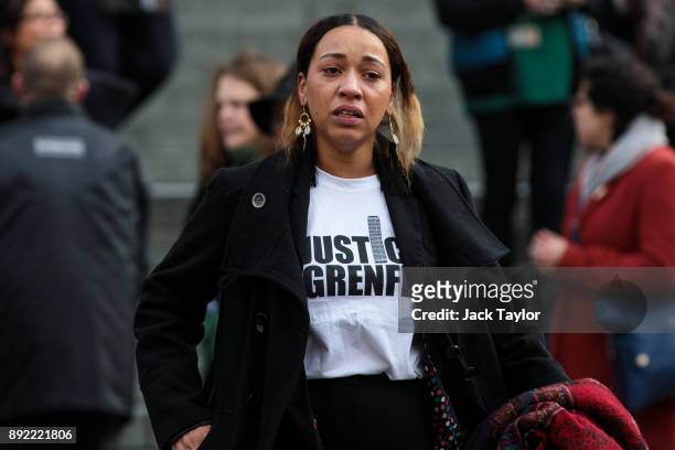 Mourner cries as she leaves the Grenfell Tower national memorial service held at St Paul's Cathedral on December 14, 2017 in London, England. The...