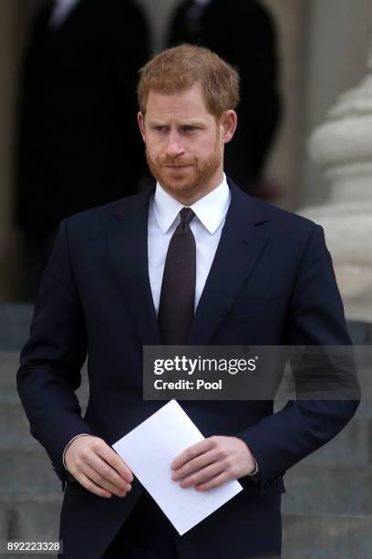 Prince Harry leaves after attending the Grenfell Tower National Memorial Service at St Paul's Cathedral on December 14, 2017 in London, England. The...