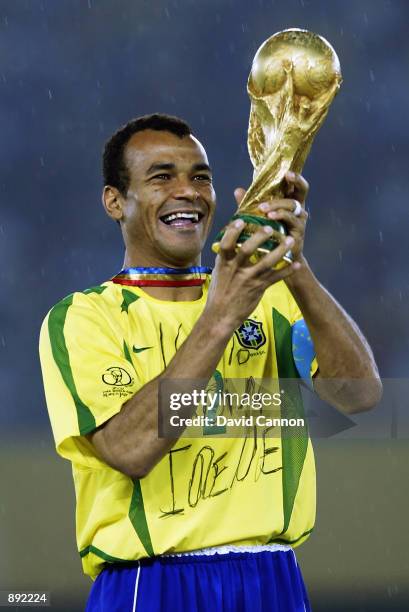 Brazil captain Cafu lifts the trophy after the Germany v Brazil, World Cup Final match played at the International Stadium Yokohama in Yokohama,...