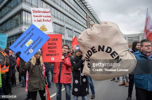 Employees of German engineering giant Siemens protest against the planned closure of a local facility on December 14, 2017 in Offenbach, Germany....