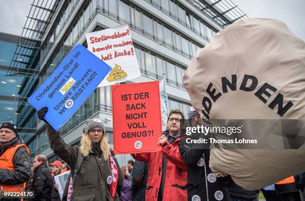 Employees of German engineering giant Siemens protest against the planned closure of a local facility on December 14, 2017 in Offenbach, Germany....