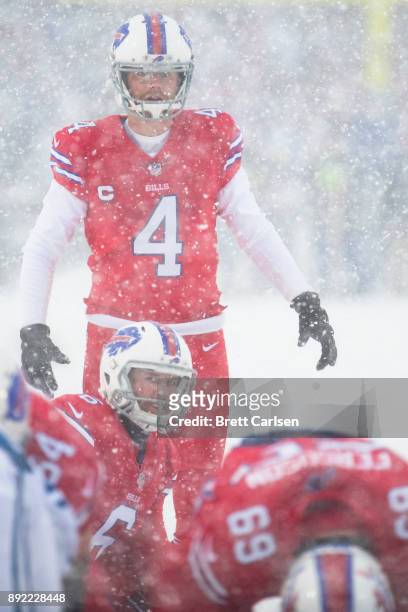 Colton Schmidt and Stephen Hauschka of the Buffalo Bills ready for the snap on a successful point after try during the second quarter against the...