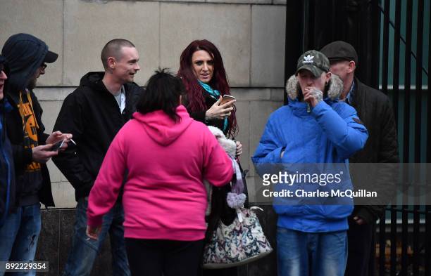 Britain First deputy leader Jayda Fransen can be seen using her smart phone outside Belfast Laganside Courts on December 14, 2017 in Belfast,...