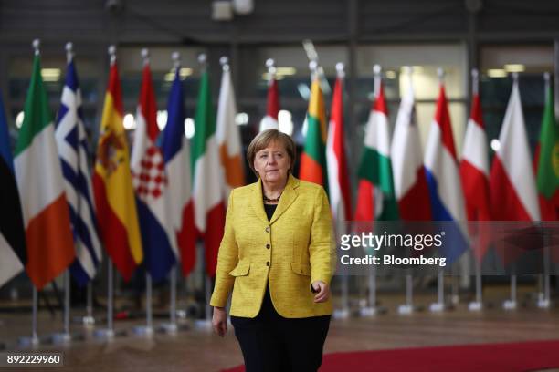 Angela Merkel, Germany's chancellor, arrives at a European Union leaders summit at the Europa Building in Brussels, Belgium, on Thursday, Dec. 14,...