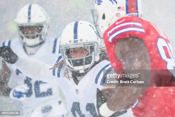Matthias Farley of the Indianapolis Colts lines up a tackle on Charles Clay of the Buffalo Bills during the third quarter at New Era Field on...