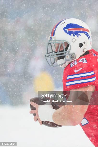 Nick O'Leary of the Buffalo Bills runs with the ball after a reception during the third quarter against the Indianapolis Colts at New Era Field on...