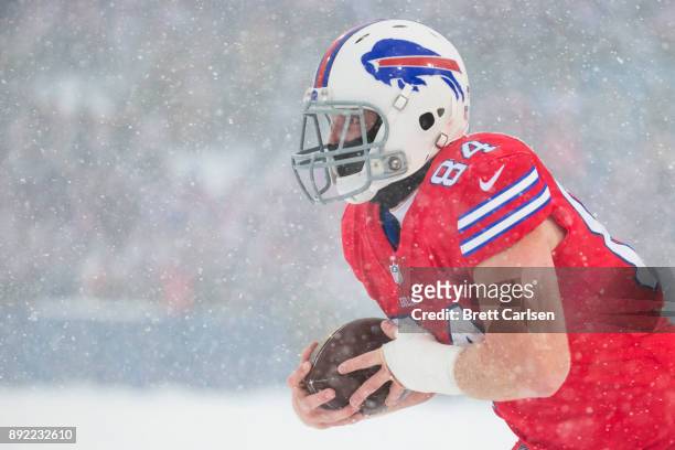 Nick O'Leary of the Buffalo Bills runs with the ball after a reception during the third quarter against the Indianapolis Colts at New Era Field on...