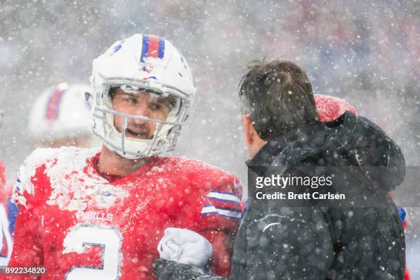 Nathan Peterman of the Buffalo Bills is walked off the field by trainers during the third quarter against the Indianapolis Colts at New Era Field on...