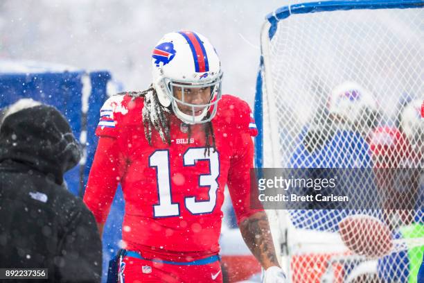 Kelvin Benjamin of the Buffalo Bills jogs on the sideline with trainers watching during the second half against the Indianapolis Colts at New Era...